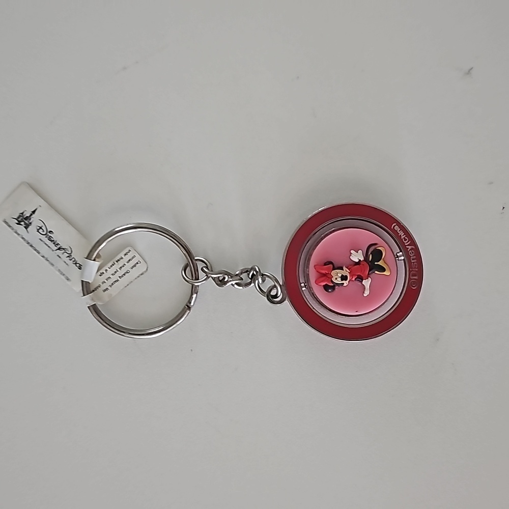New Walt Disney Minnie Mouse Spinner Keychain featuring a cat design - Picture 2 of 8
